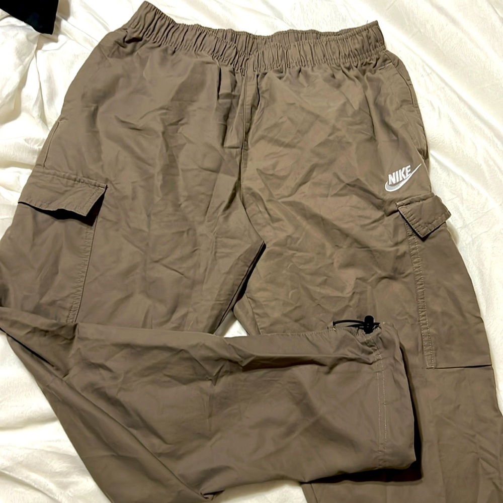 Tan Nike jeggings